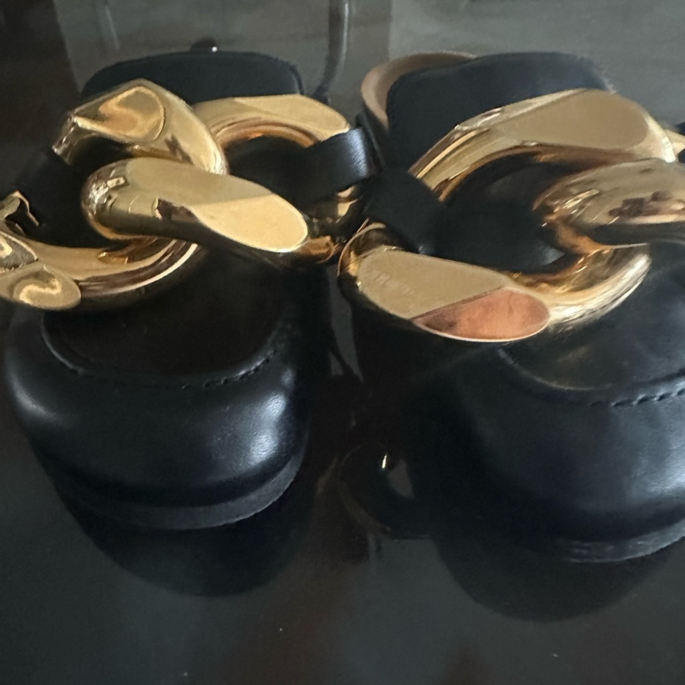 JW Anderson Mules with Gold Hardware in Black. Gently worn